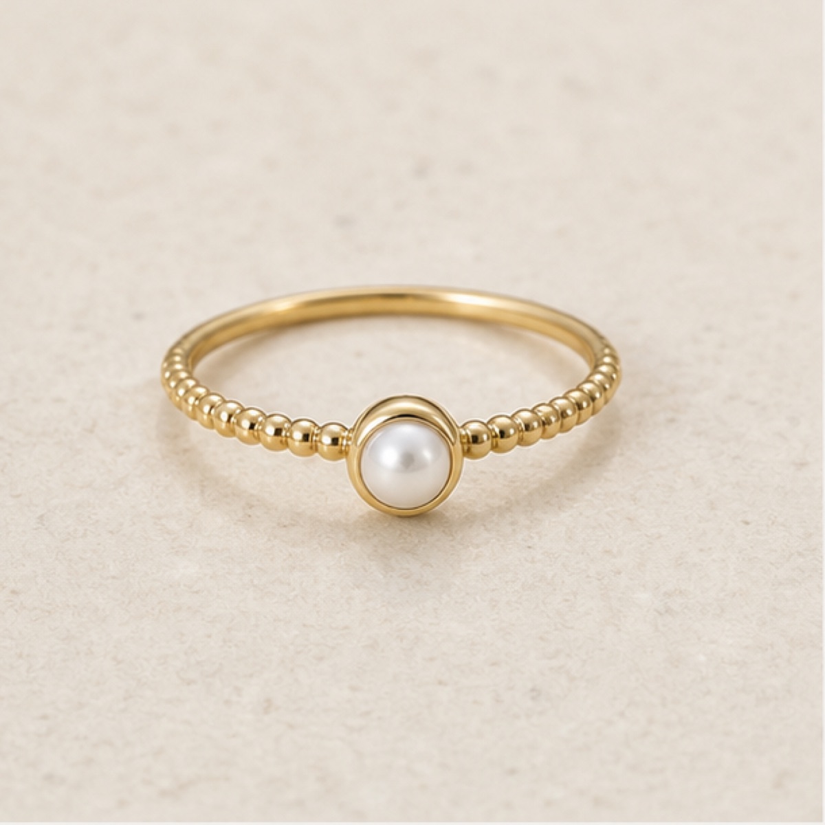 Lumière Stone Ring styled on warm stone